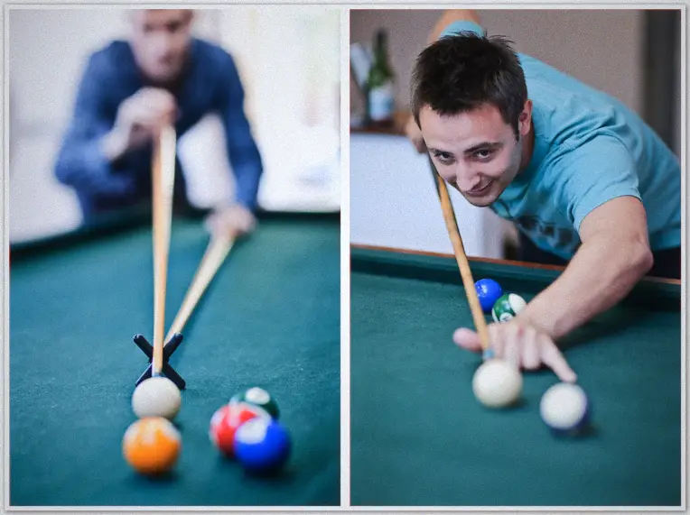 Peth Wedding Photographers Wedding guests take turns at the pool table, chalking a cue and leaning in over the green felt
