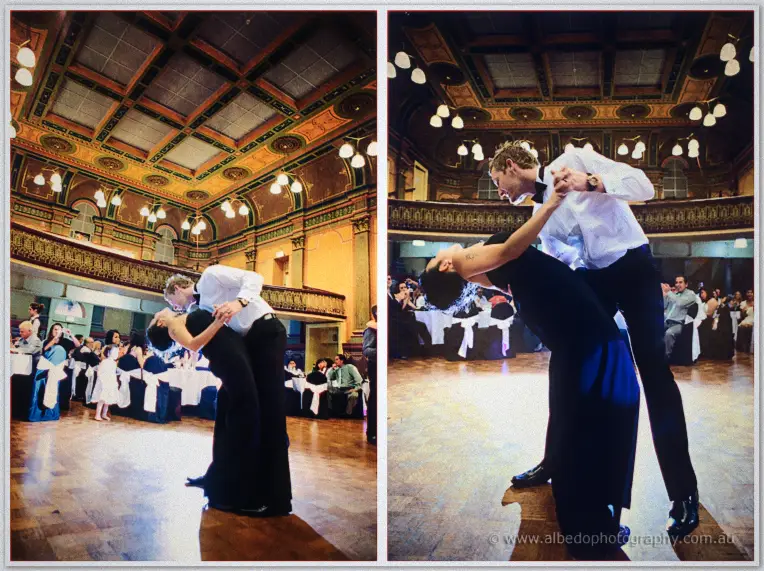 Fremantle Wedding | Charlene and Phil Phil dips Charlene low across the parquetry dance floor during their first dance in the grand hall