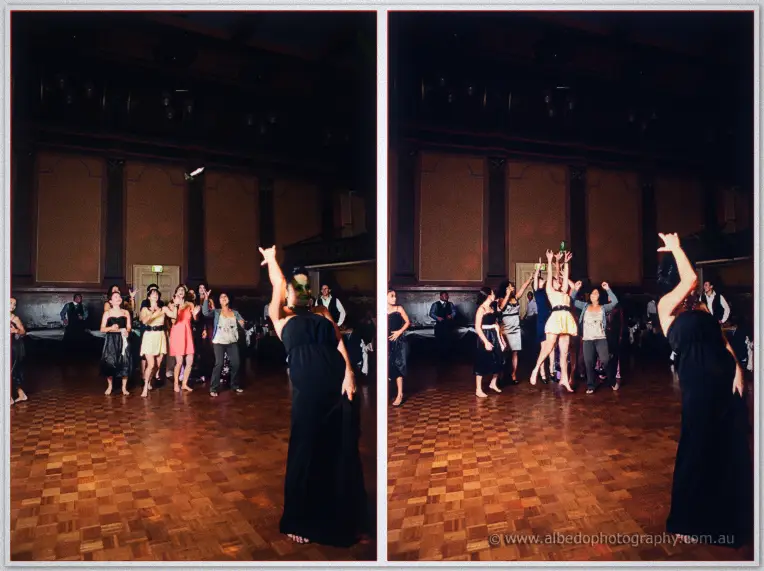 Fremantle Wedding | Charlene and Phil Charlene flings her bouquet over her shoulder to friends reaching skyward on the dance floor at night