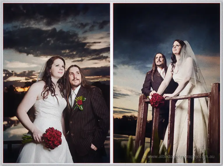 The couple stands close under brooding clouds in two portraits, red roses resting on the railing