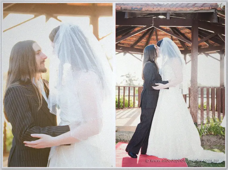 Jenn and Lance kiss on the red carpet beneath the gazebo beams, her veil catching the low sun