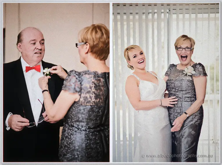 Emily's mother pins a boutonniere on her husband, then both laugh with the bride by the blinds