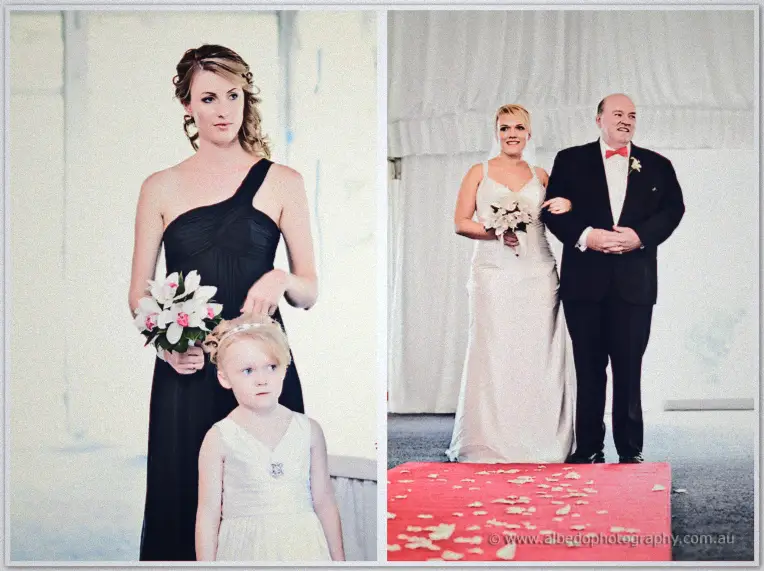 A bridesmaid guides the flower girl down the aisle, then Emily walks in on her father's arm