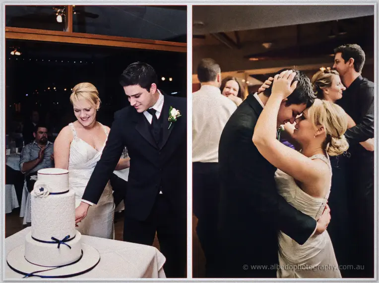 The couple cuts their navy-ribboned cake, then dance cheek to cheek among the guests