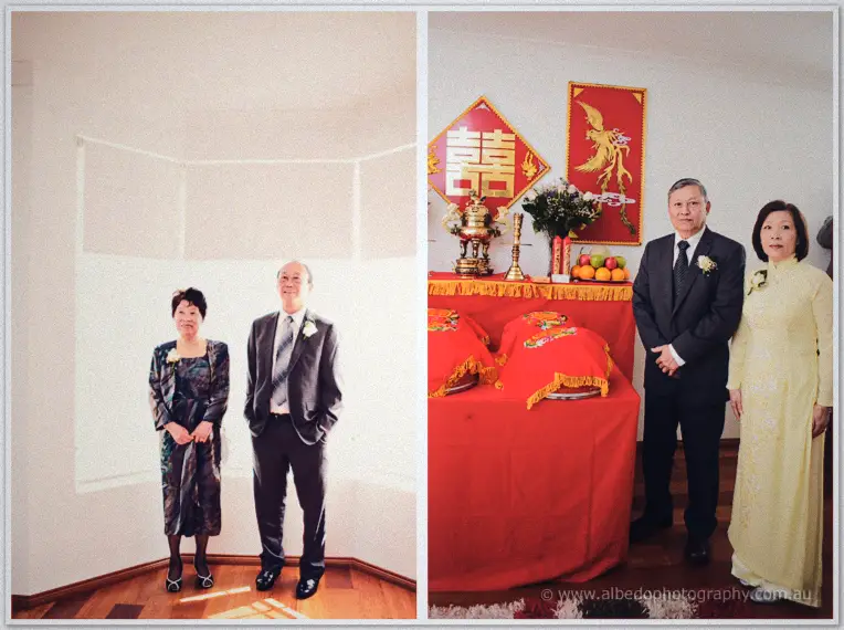 Khoa's parents pose by a sunlit bay window and beside the altar draped in red with double-happiness banners.