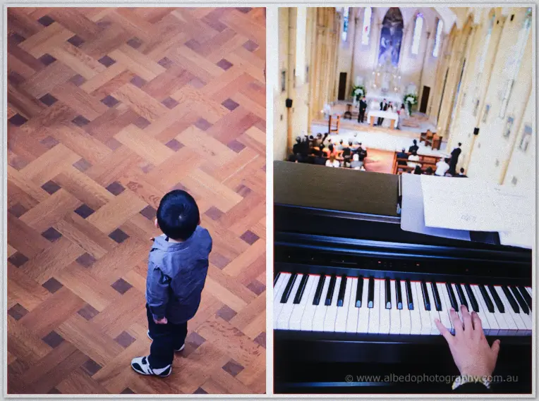 A small boy in grey stands alone on the parquetry, and hands play hymns on the piano facing the wedding mass.