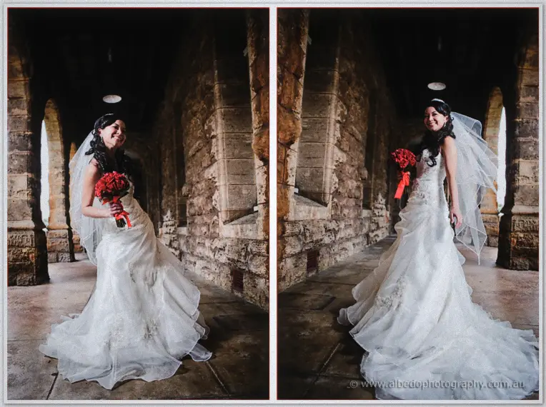Laughing, Michelle twirls her ruffled gown in a dim stone archway, red rose bouquet in hand.