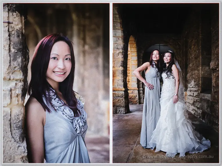 A bridesmaid in a rosette gown smiles beside a stone wall before joining Michelle.