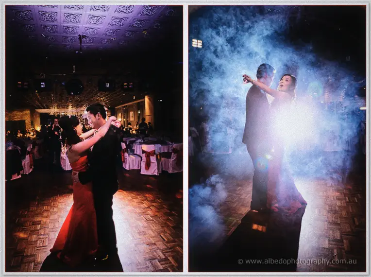 A guest in red raises the rose bouquet triumphantly on the parquet dance floor at the reception.