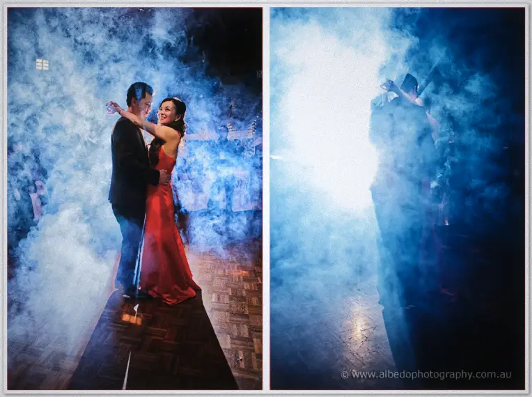 Michelle in red dances with Khoa across the parquet as fog rolls through the ballroom.