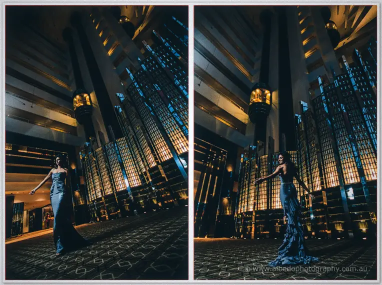 Lydia sweeps through the vast hotel atrium at night, her grey gown trailing across the patterned carpet
