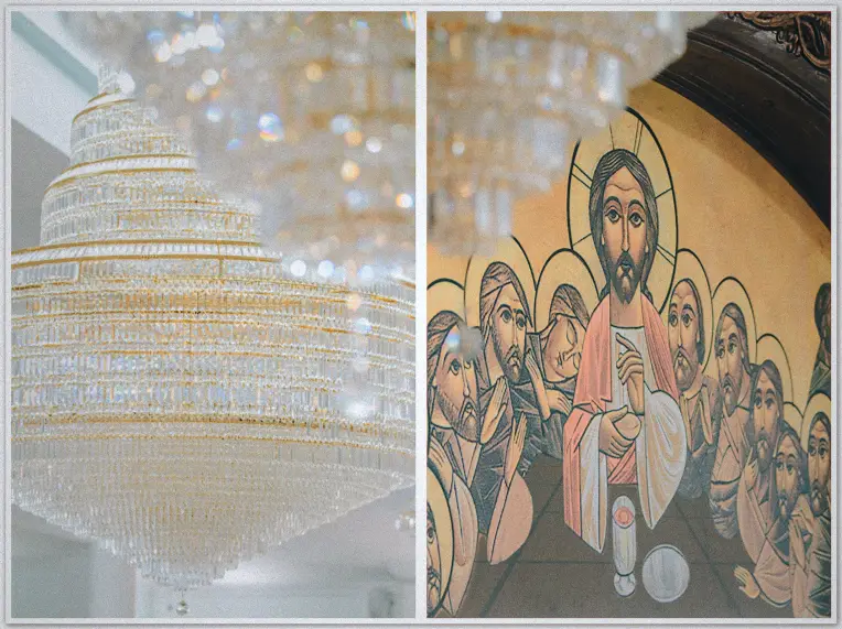 Sparkling chandelier crystals frame a painted icon of Christ and his disciples inside the church