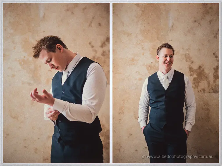 Diptych of groom Shannon in a navy vest checking his cuff, then grinning against a plaster wall