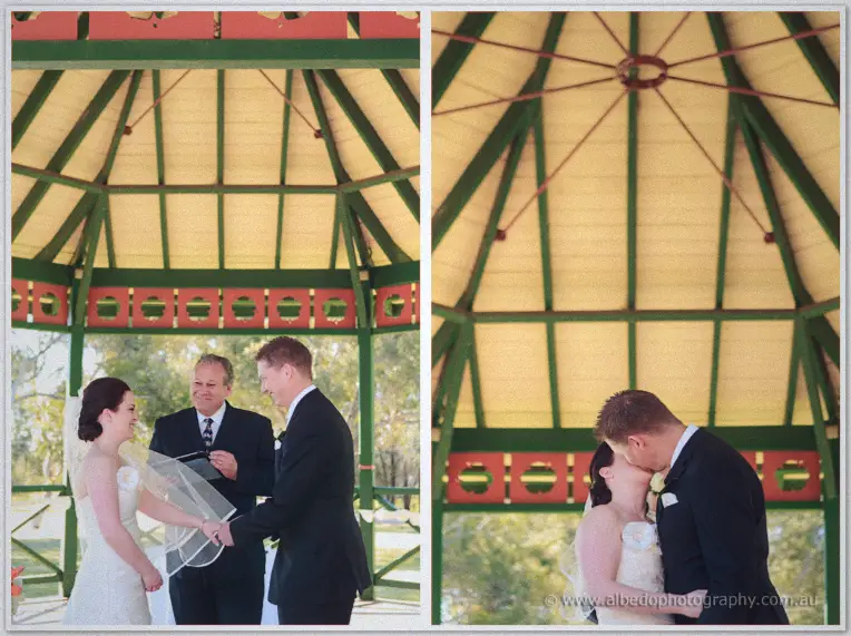 Two-frame moment of ring exchange and the couple's first kiss at the gazebo