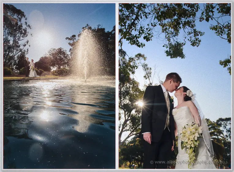 Fountain reflections beside a backlit kiss under the gum trees