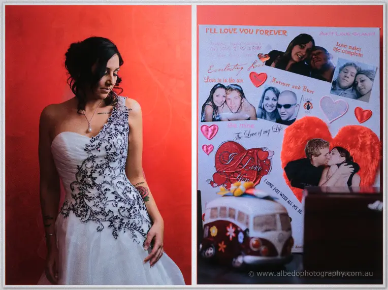 Jenna looks down thoughtfully next to a collage poster of couple photos, hearts and love notes