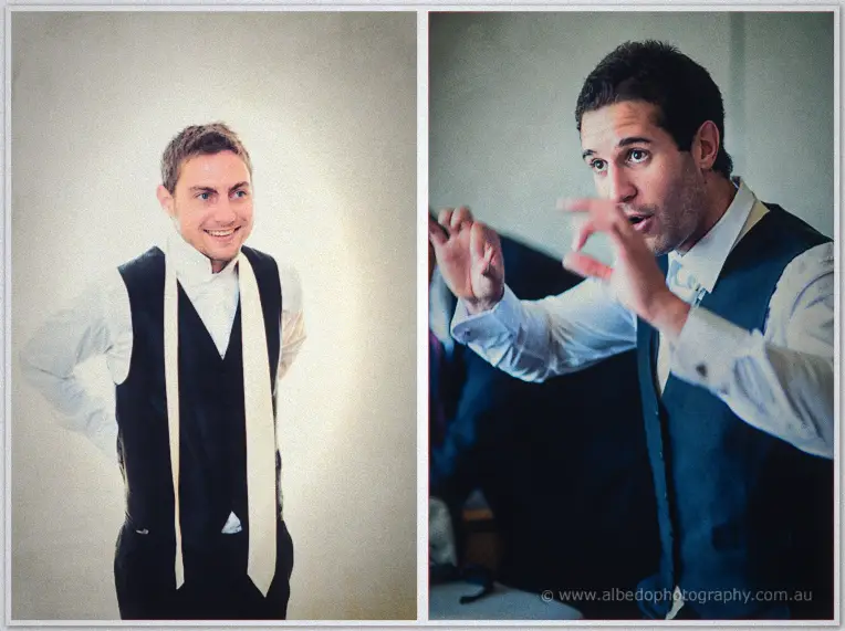A groomsman grins mid-tie while another gestures wildly telling a story in the suite