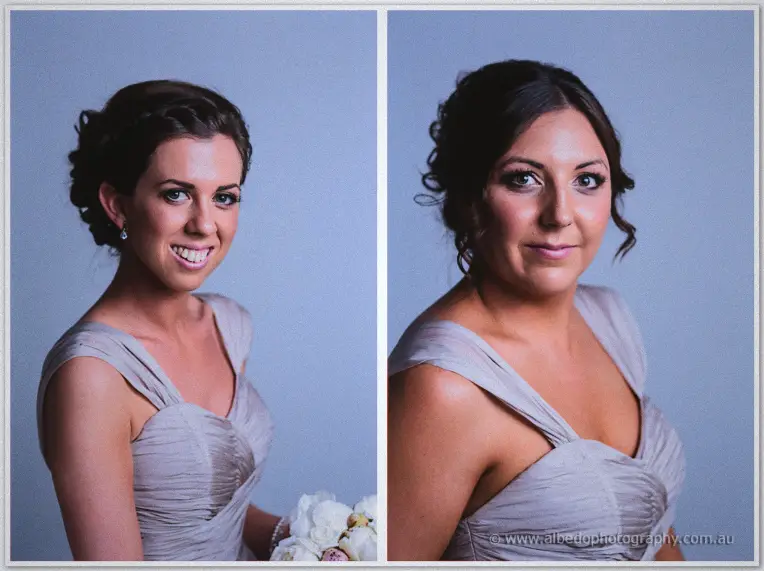 Two bridesmaids in draped lilac gowns smile in soft studio portraits against pale blue