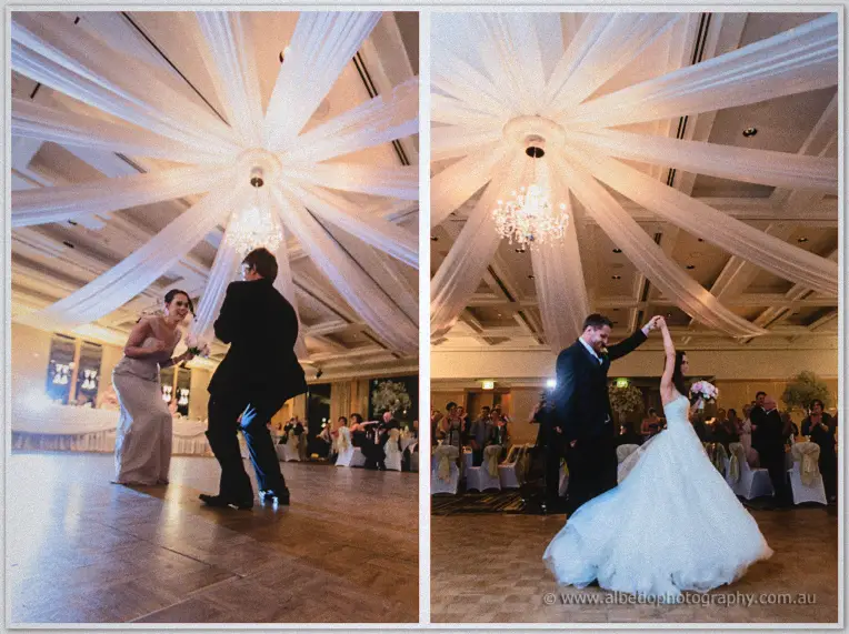 Two frames of first-dance twirls on the parquetry floor under the ballroom's draped ceiling and chandelier