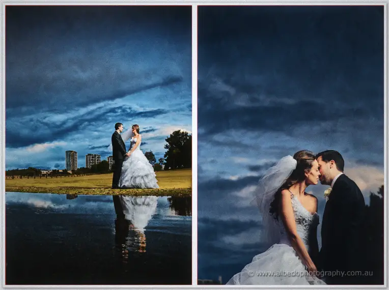 Storm clouds mirror over the waterhole as Michele and Nick embrace on the far bank.