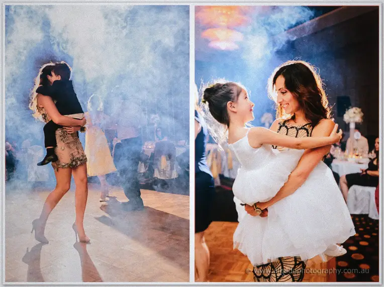 Amid swirling haze, a sequinned dancer twirls and a guest swings the delighted flower girl.