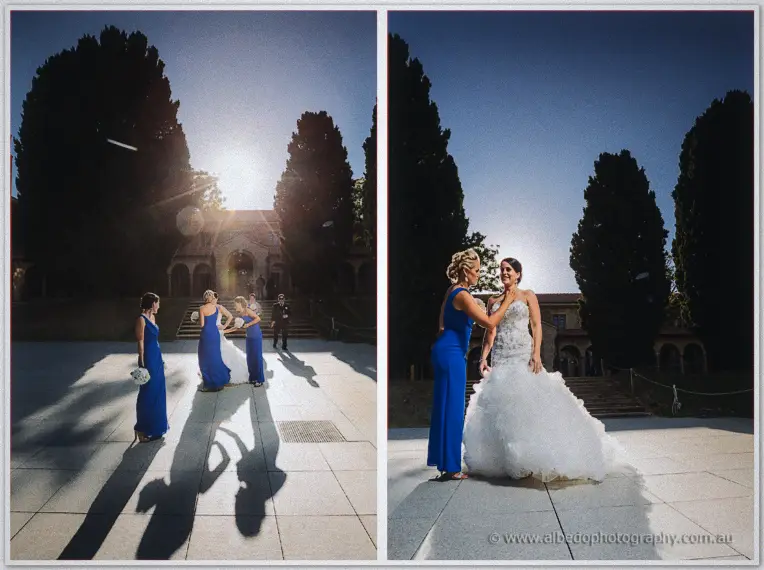 Bridesmaids adjusting Allison's gown in glaring backlight beneath tall trees and colonnades