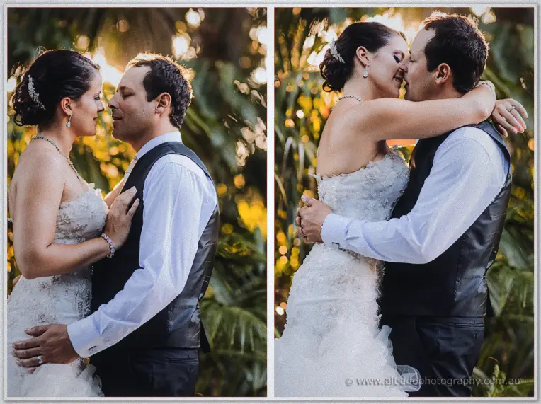 Greg pulling Allison close under golden foliage before she wraps her arms around his neck for a kiss.
