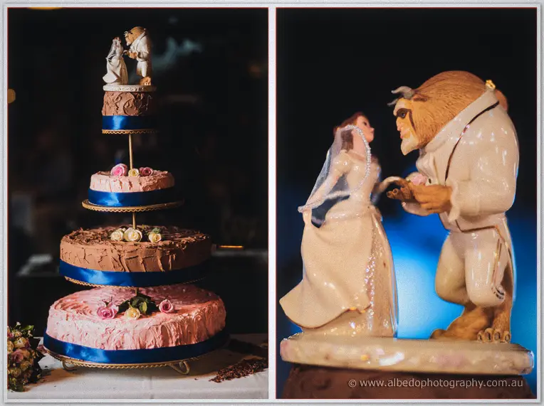 A four-tier pink and chocolate cake crowned with a Beauty and the Beast topper.