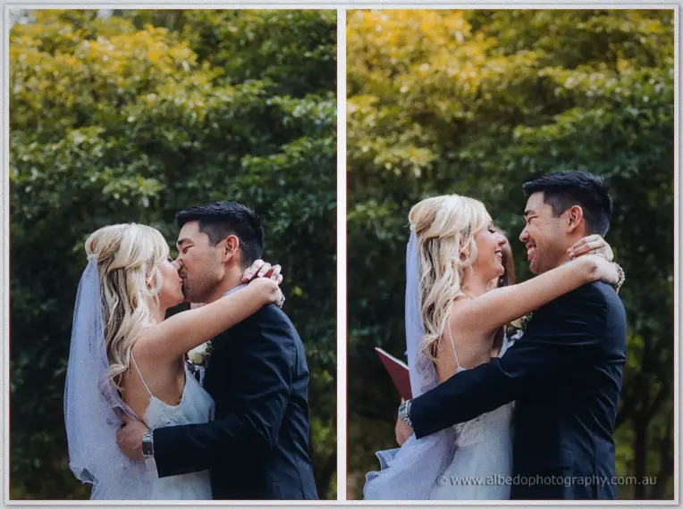 Kristyn and Chris share their first kiss and a laughing embrace under golden garden foliage.