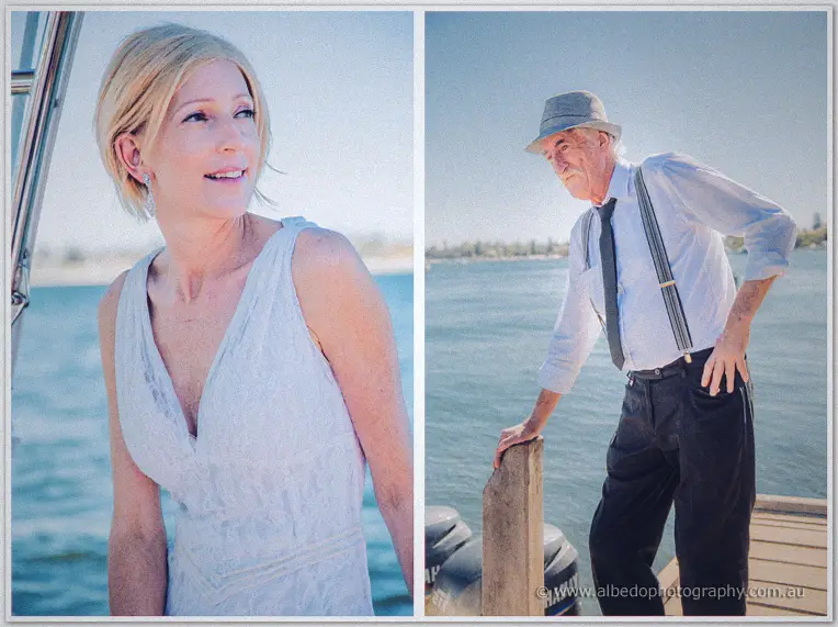 Tansy watches the water as an older gent in a trilby and suspenders leans on the jetty rail