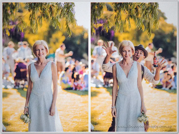 Tansy poses in her lace gown before her groom photobombs playfully with a beer bottle