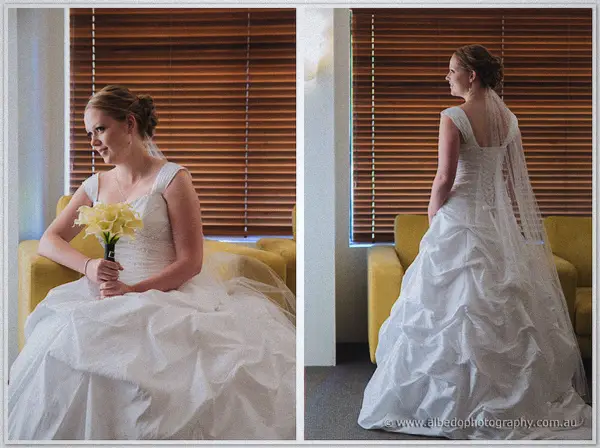 Cayla seated with a calla lily bouquet and standing to show her gown's back and long veil