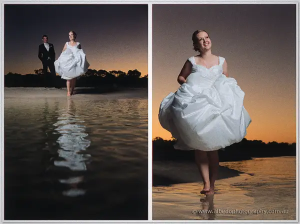 Cayla lifts her gown across wet reflective sand, then carries it barefoot through glowing shallows at sunset