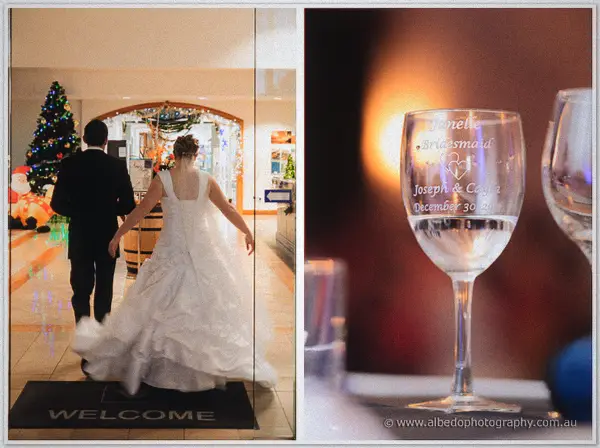 The couple enters the resort lobby past a decorated Christmas tree while an etched glass glows by candlelight