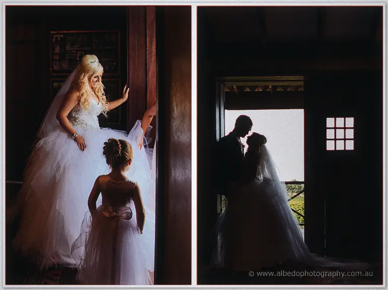 Steph and the flower girl share a moment indoors, then kiss silhouetted in a bright doorway.
