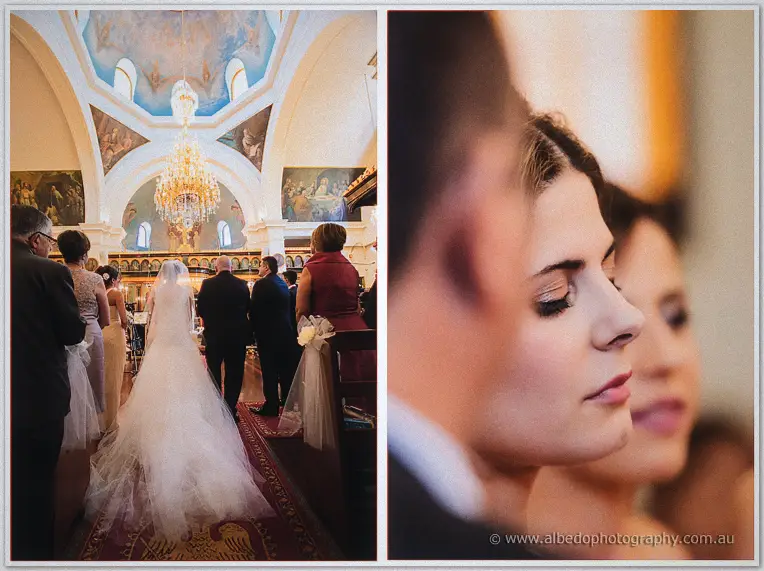 Elena's tulle train sweeps the red runner under the frescoed dome; beside it her prayerful profile