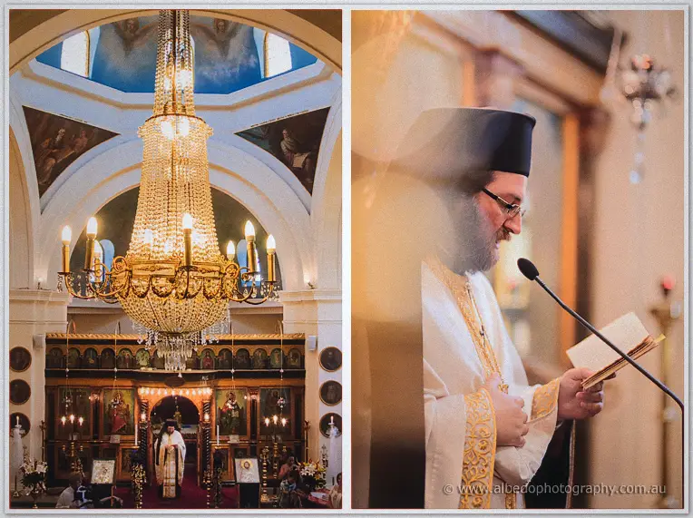 Crystal chandelier over the iconostasis beside the black-klados priest reading from the Gospel