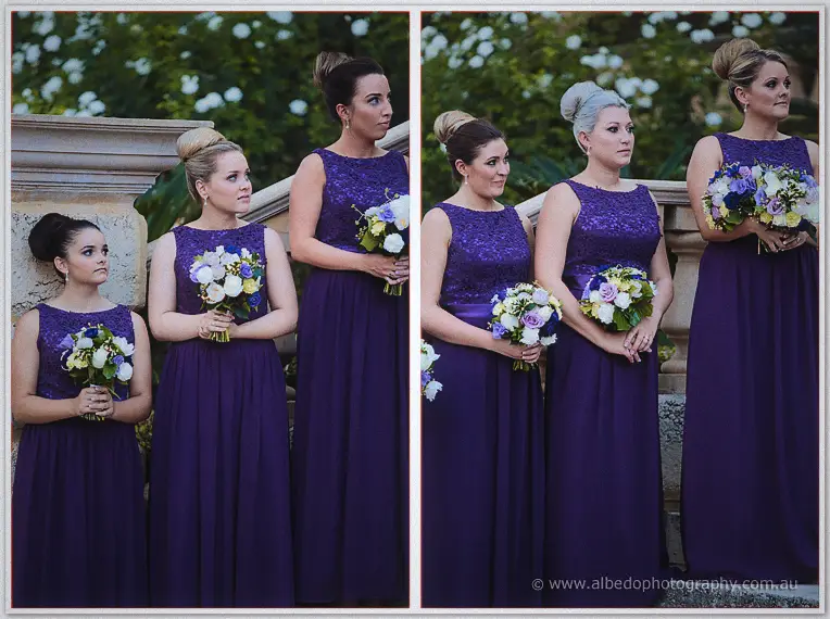 Bridesmaids in purple lace listen intently from the sandstone steps during the garden vows