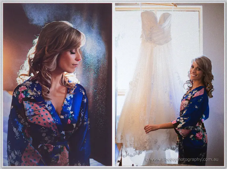 Cristina glances down in lamplight, then smiles beside her strapless lace gown by the window