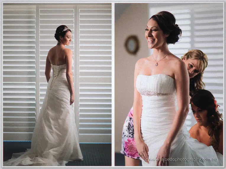 Side view of Elisha's flowing gown train, then her laughing as friends fuss around her dress