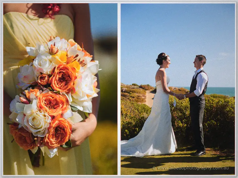 Close-up of the peach and cream bouquet beside the couple holding hands by coastal scrub