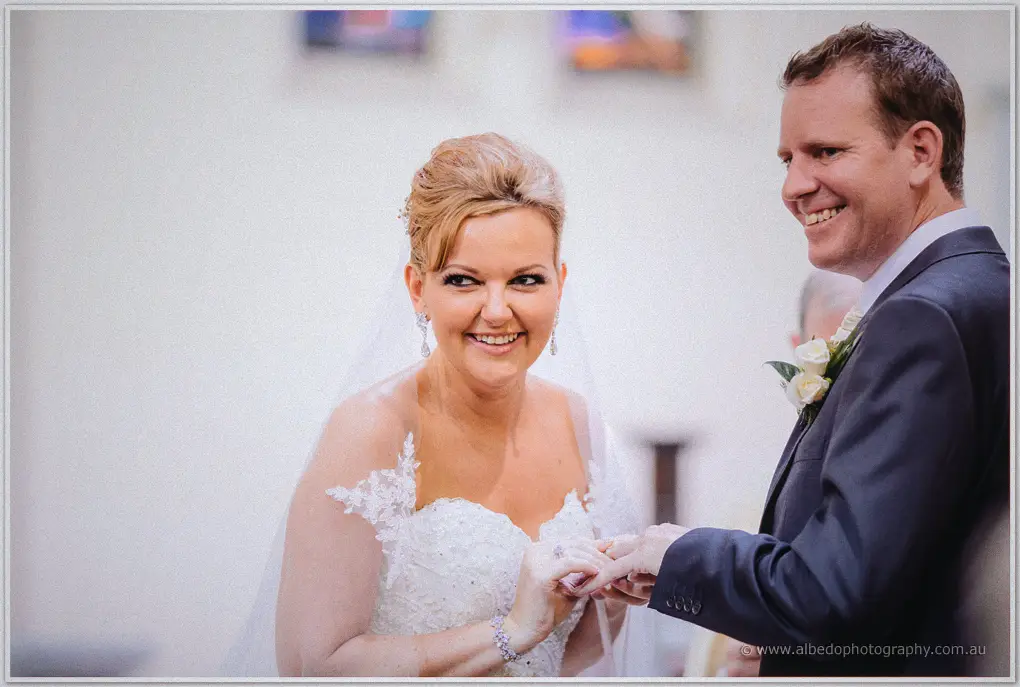 Kristina flashes a grin at the camera while giving Ashley his ring