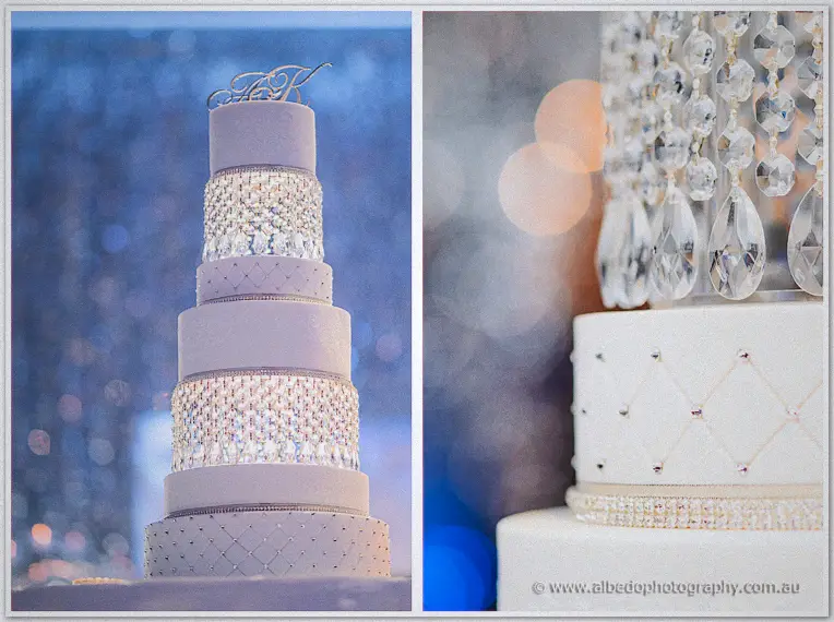 Crystal droplets and quilted piping adorn the five-tier cake in cool blue light