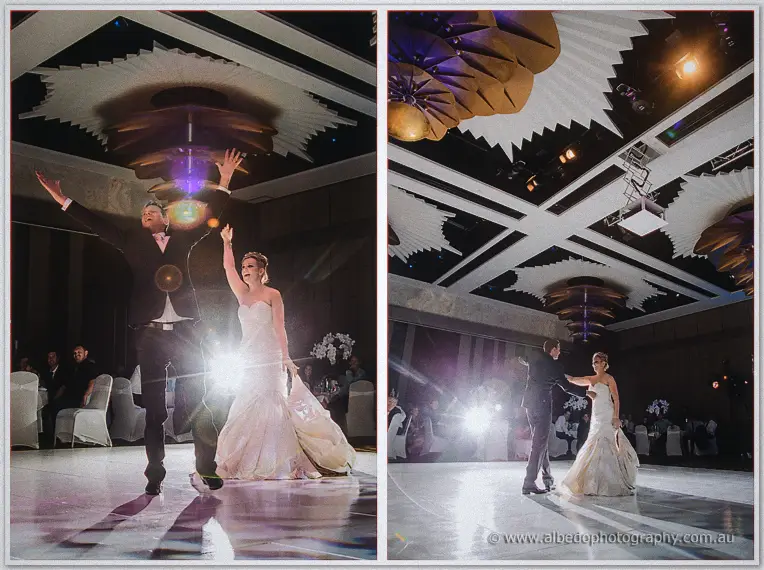 Spotlights flare as Ashley throws his arms up mid-dance with Kristina on the Astral Ballroom floor.