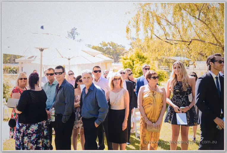 Wedding guests watch from the lawn as the Brookleigh ceremony begins