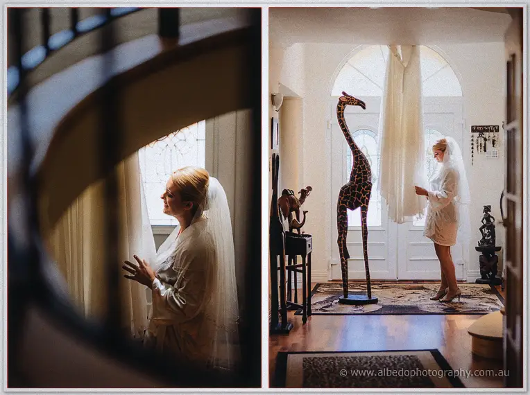 Teigan smiles by a window before her dress, hung on the door beside a wooden giraffe carving
