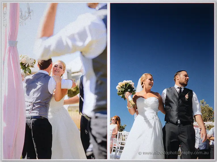Congratulated by family then walking arm in arm under a deep blue sky as newlyweds