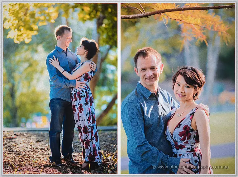 Loan and Alex hug beneath golden autumn leaves in a sunlit park, then pose side by side smiling