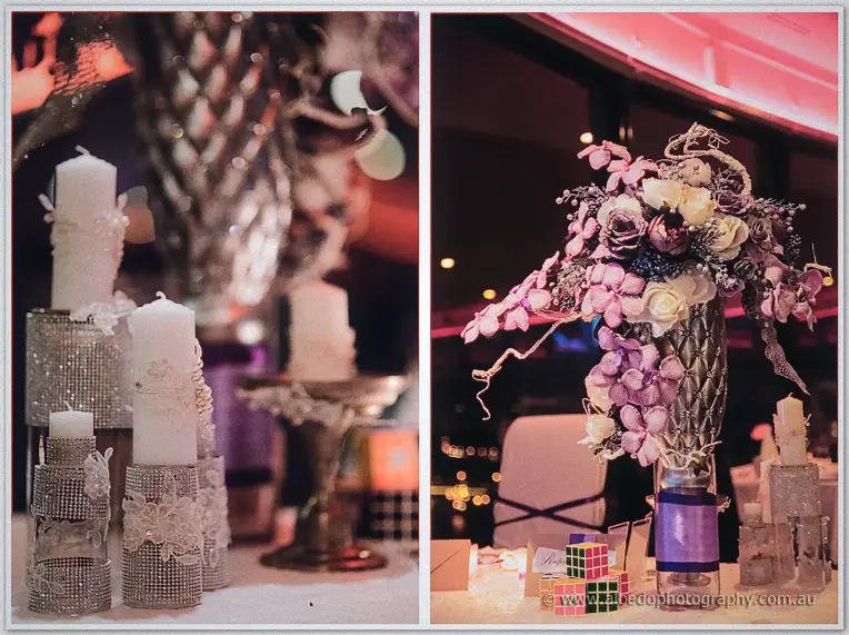 Lace-wrapped candles and a purple orchid centrepiece with rubik's cube numbers adorn the table