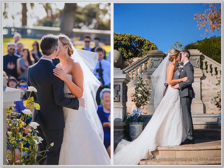Lauren and Ryan share their first kiss, then pose beneath the stone staircase urns